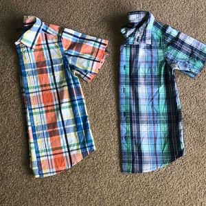 Two plaid button down shirts
